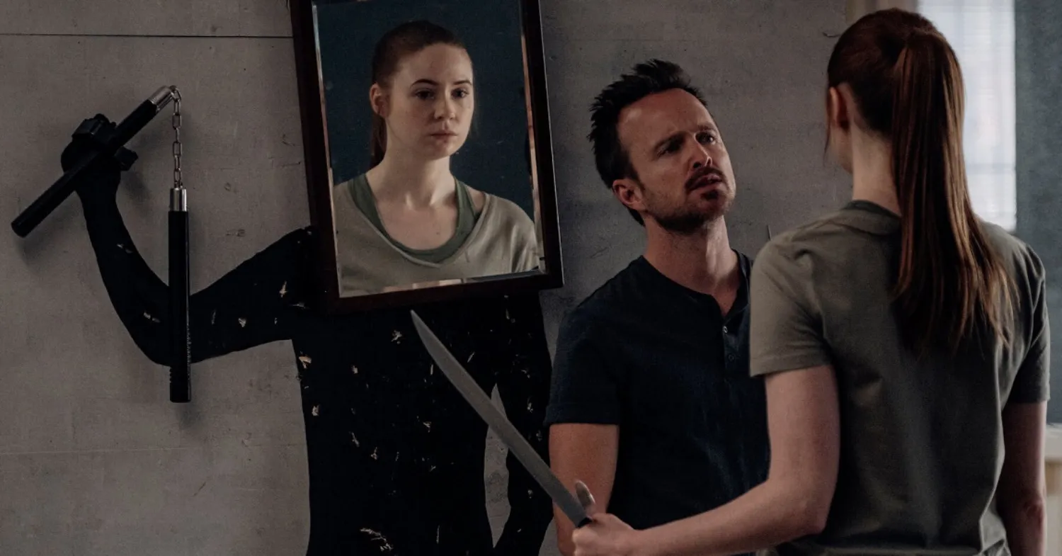 Karen Gillan and Aaron Paul in Dual (2022)